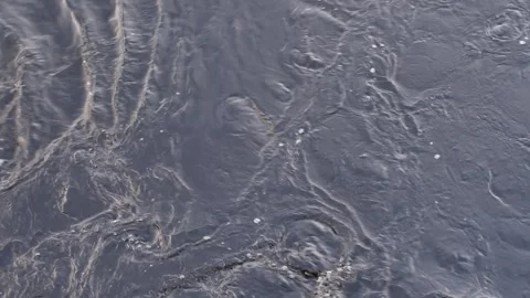 Flowing water with chaotic patterns, eddy whirlpools and ripples 스톡 동영상 271335462