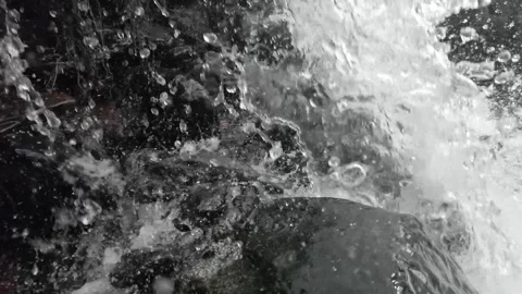 Flowing water in closeup slomotion Stock Footage 238829786