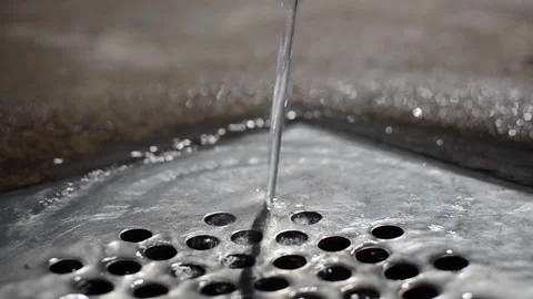 Flowing water to the drain Stock Footage 140623154