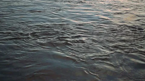 Flowing Water During Sundown - Closeup Video stock 33804230