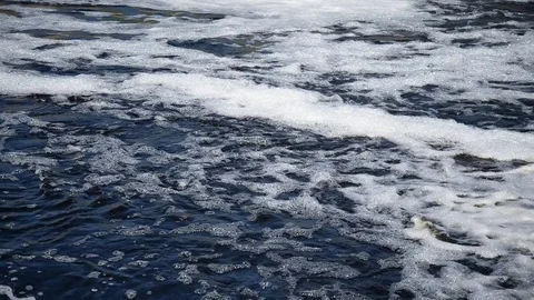 Flowing water with foam on the river. Stock Footage 76322050