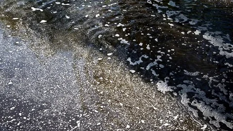 Flowing water with foam on the river. Stock Footage 76323286