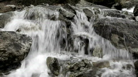 Flowing water in the mountains Stock Footage 821784