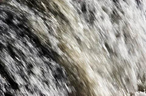 Flowing water Stock Photos