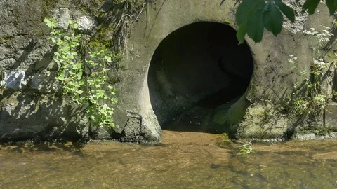 Flowing Water from River Sewer Stock Footage 108967320