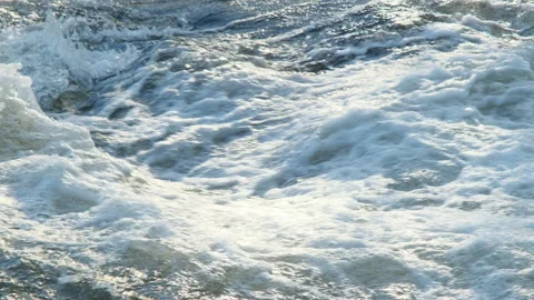 Flowing water stream. A river flows over rocks in the mountains.  Stock Footage 171211500