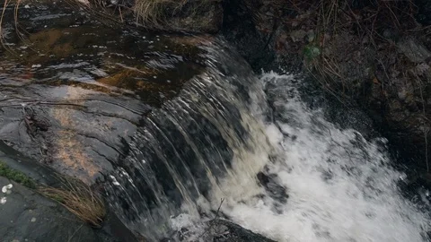 Flowing water stream, waterfall in the fall 4K 60fps Slow motion Stock Footage 100529633