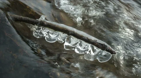 Flowing water stream in winter Stock Footage 48858940