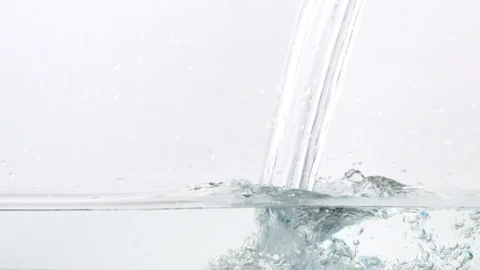 Flowing water on white background Stock Footage 123687219