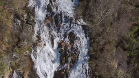 Flowing Waters Over Rugged Mountains At Fervenza das Brañas 库存影片 334045165