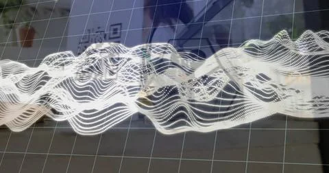Flowing white waveform mesh across green grid overlay on desk at office, with QR Stock Photos
