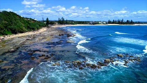 Flting over coast Stock Footage 99780819
