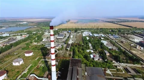 Flue-gas stack tower thermal power station HD aerial video. Industrial pollution Stock Footage 68583439