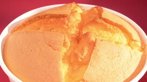 A fluffy baked sponge cake rotating close up 스톡 동영상 346795030