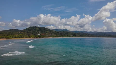 Fluffy Billowy Clouds Above Samara, Costa Rica Beach Aerial Time Lapse Stock Footage 147103117