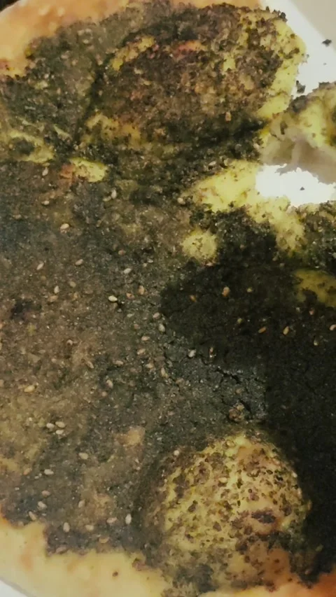 Fluffy bread with a traditional Arabic toppings Stock Footage 278496013