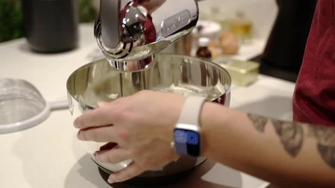 Fluffy cheesecake batter mixed with hand mixer Stock Footage 222166130