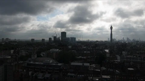 Fluffy cloud rolling over the cityscape Video stock 94398995