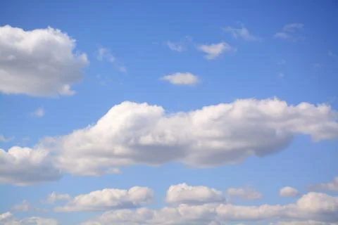 Fluffy cloud in a saturated blue sky.	17 Stock Photos