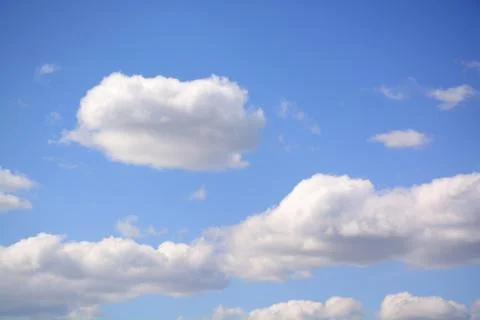 Fluffy cloud in a saturated blue sky.	16 Stock Photos