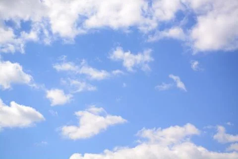 Fluffy cloud in a saturated blue sky.	15 Stock Photos