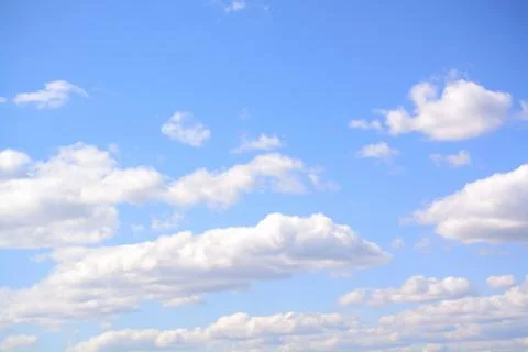 Fluffy cloud in a saturated blue sky.	8 Stock Photos