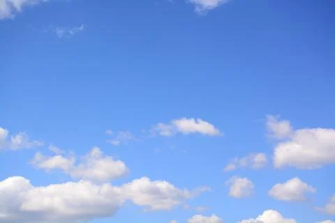 Fluffy cloud in a saturated blue sky.	7 Stock Photos