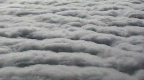 Fluffy Clouds from above Stock Footage 300006