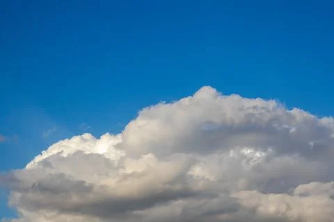Fluffy Clouds Against Blue Sky Stock Photos