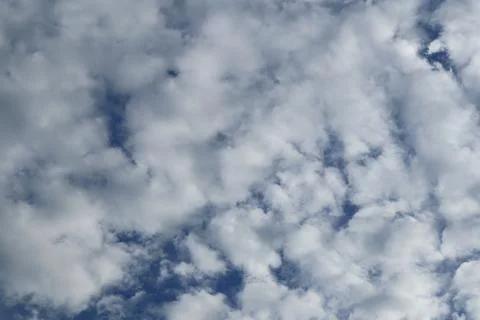 Fluffy Clouds Against Deep Blue Sky, Weather Pattern and Heavenly View Stock Photos