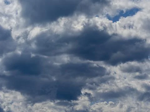 Fluffy clouds and sky background Stock Photos
