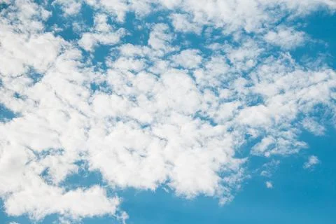 Fluffy clouds on  blue sky during day. Copy space Stock Photos
