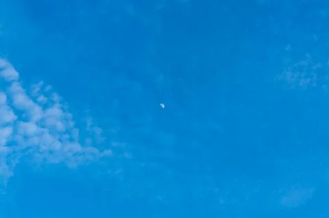 Fluffy clouds on the blue sky Stock Photos