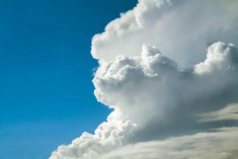 Fluffy clouds on a blue sky Stock Photos