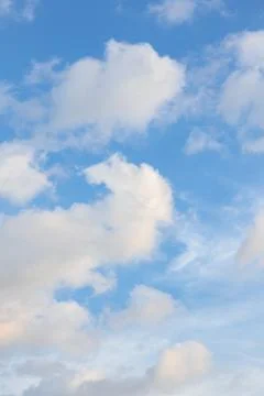 Fluffy Clouds in a Blue Sky Foto stock