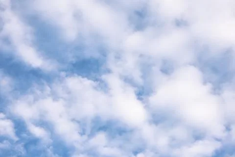 Fluffy Clouds in a Blue Sky Stock-Fotos