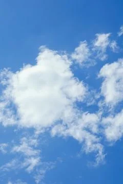 Fluffy Clouds in a Blue Sky Fotos Stock