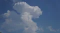Fluffy Clouds In Blue Sky Tower Of Clouds Dissipating 4k or 4k+ Resolution