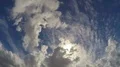 Fluffy clouds floating rapidly in evening summer sky, cloudscape timelapse 4k or 4k+ Resolution