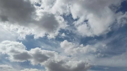 Fluffy clouds moving in 4k footage new season nature background wallpaper Stock Footage 325670223