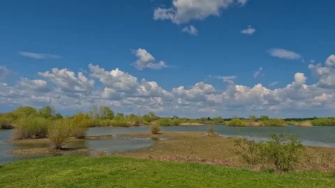 Fluffy Clouds Moving Fast Over Arges Delta Lakes Summer Time Lapse Stock Footage 341422489