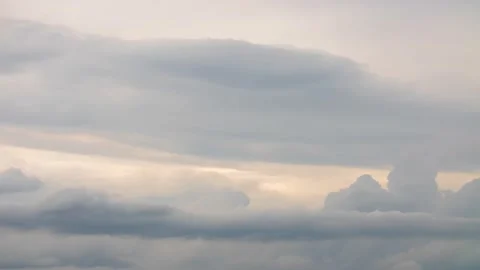 Fluffy clouds moving fast in time-lapse. Evening, cloudy heaven background Stock Footage 134598850