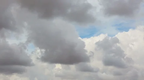 Fluffy clouds moving over the sky Stock Footage 58425853