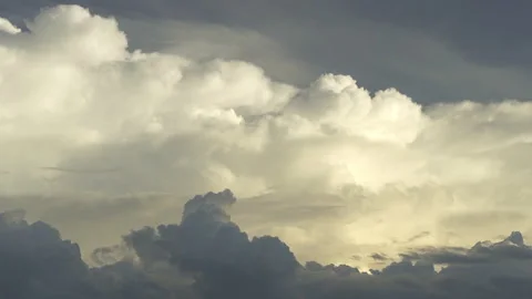 Fluffy clouds moving in sky timelapse Stockbeeldmateriaal 337639654