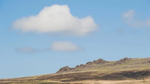 Fluffy clouds over Carn Menyn Rocks on Preseli Hills Pembrokeshire Timelapse Stock Footage 90384689