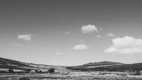 Fluffy clouds over Preseli Hills Pembrokeshire Black and White Timelapse Stock Footage 90384687
