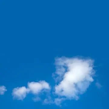 Fluffy clouds Stock Photos