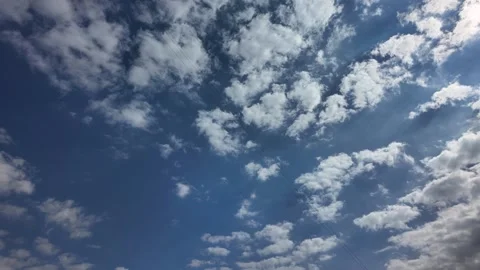 Fluffy clouds quickly float across the sky. Timelapse Stock Footage 343002517