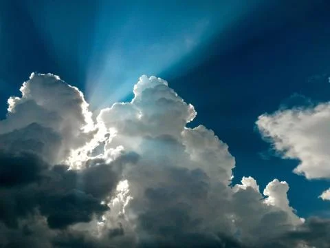 Fluffy clouds on the sky. cloudy day in the forest Stock Photos