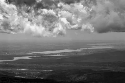 Fluffy clouds on the sky. cloudy day in the forest Stock Photos